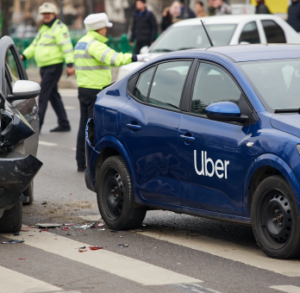 blue uber car after a car accident