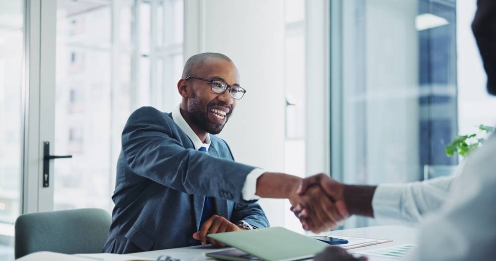 Photo of man shaking hands