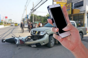 Photo of a Man Using Smartphone